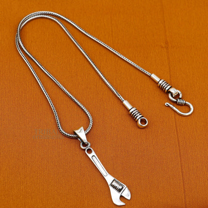925 sterling silver small tool spanner pendant with unisex divine jewelry design by TRIBAL ORNAMENTS.