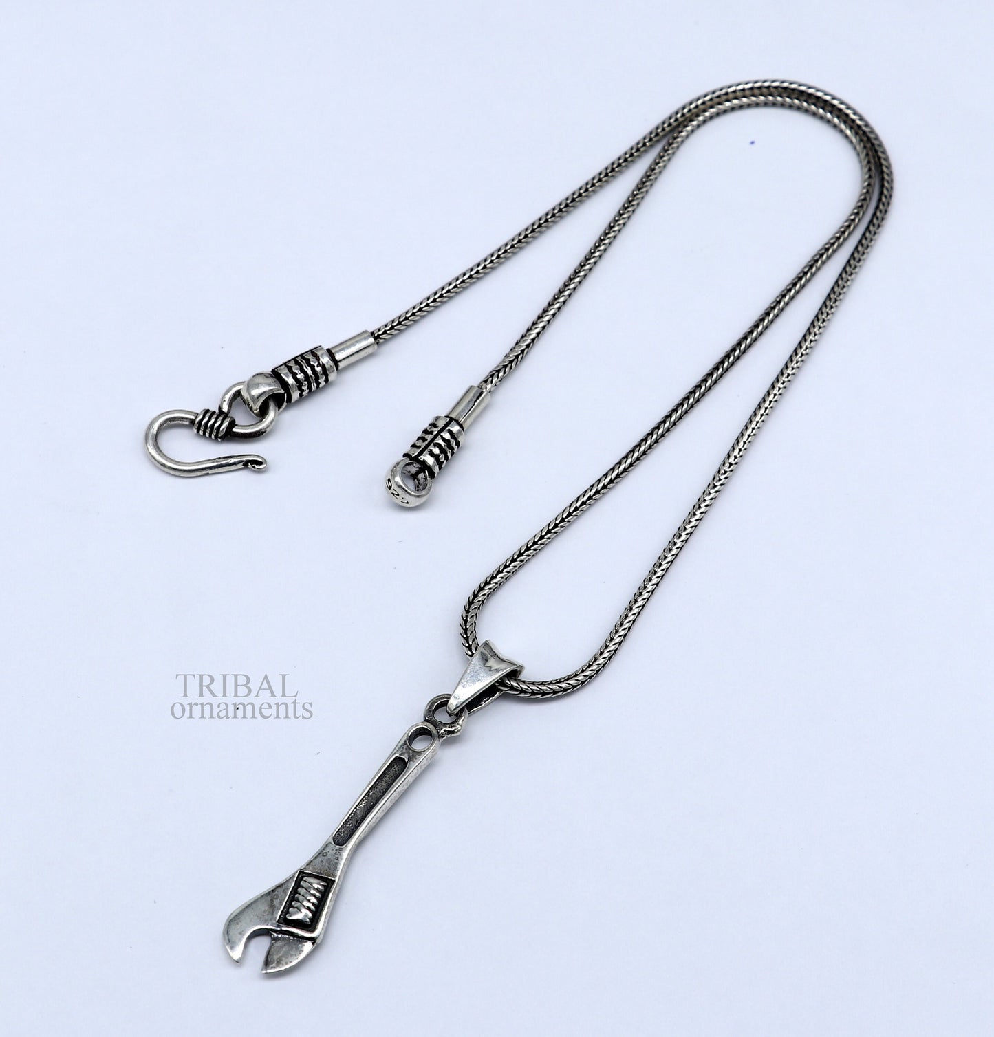 925 sterling silver small tool spanner design pendant by TRIBAL ORNAMENTS, unisex divine jewelry with handmade craftsmanship.