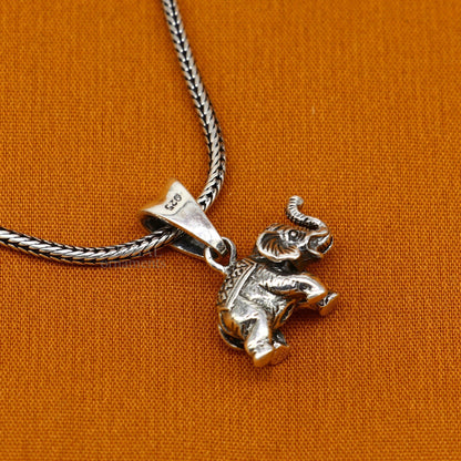 Sterling silver small elephant pendant by TRIBAL ORNAMENTS, handcrafted divine jewelry, perfect for gifting or everyday wear.