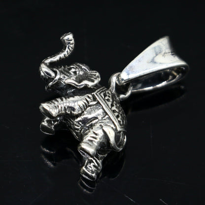 Small handmade 925 sterling silver elephant pendant from TRIBAL ORNAMENTS, perfect for gifting or divine jewelry collection.