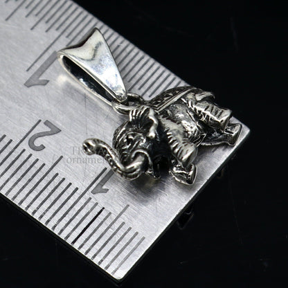925 sterling silver small elephant pendant from TRIBAL ORNAMENTS, handcrafted jewelry with intricate solid design, ideal for gifting.