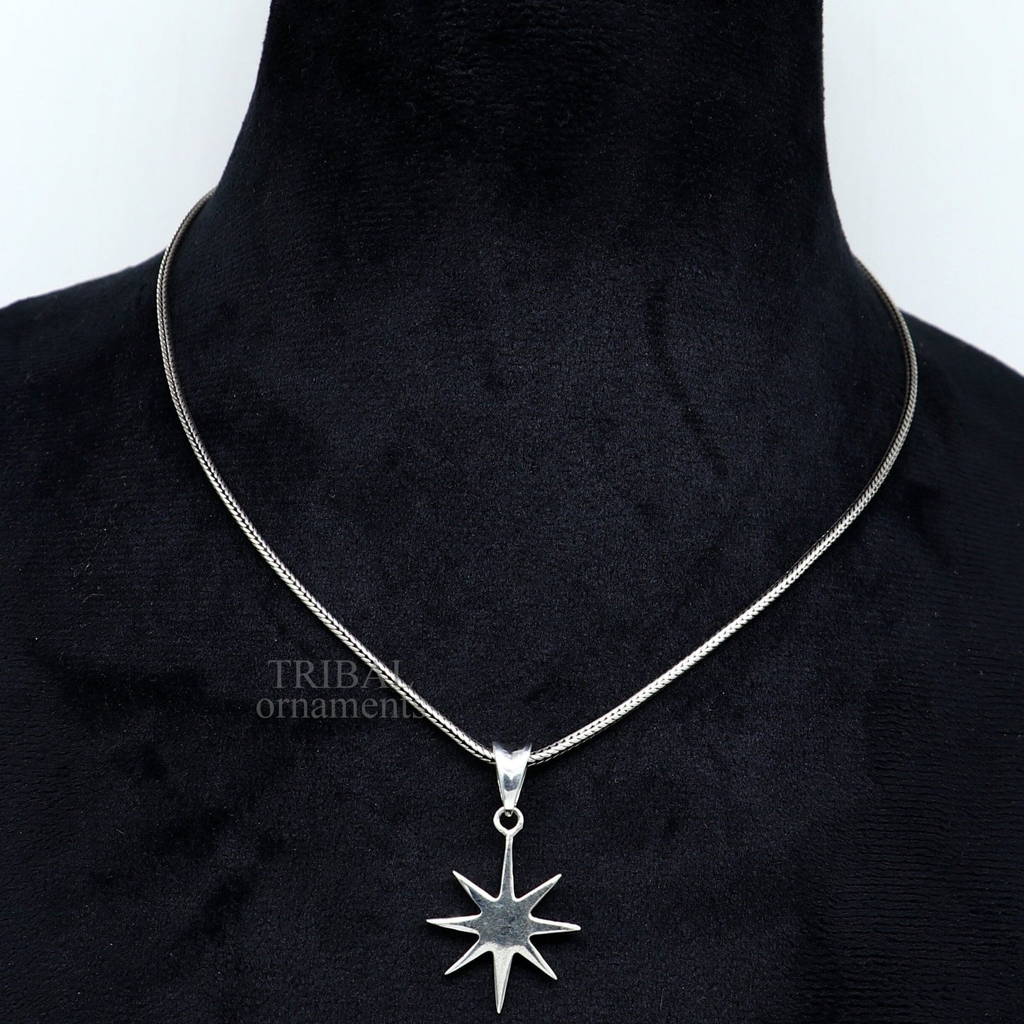 Unisex 925 sterling silver star pendant by TRIBAL ORNAMENTS, handmade elegant jewelry with a plain silver star design.