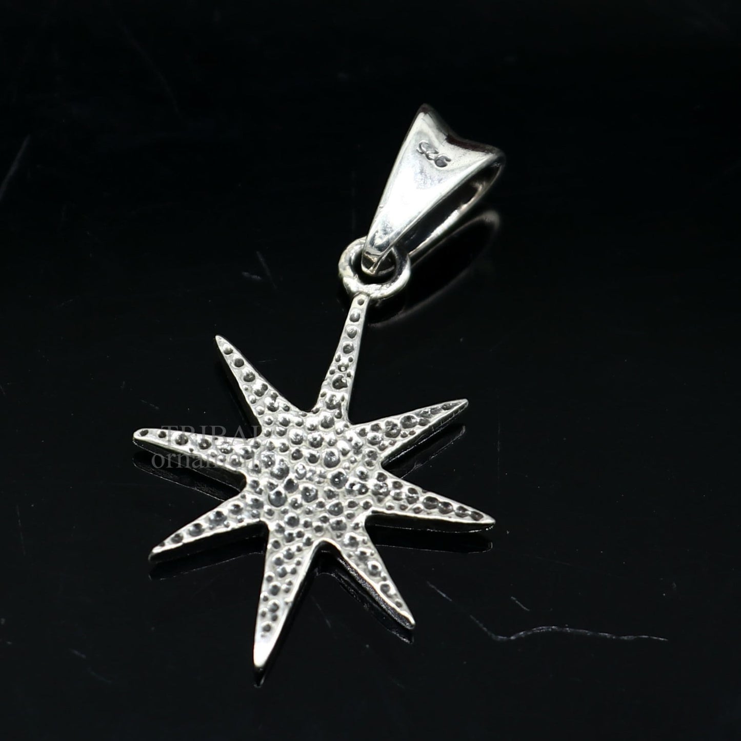 Unisex 925 sterling silver star pendant from TRIBAL ORNAMENTS, handmade elegant jewelry with a plain silver design.