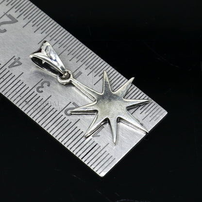 Elegant 925 sterling silver star pendant by TRIBAL ORNAMENTS, unisex handmade jewelry with a sleek, plain silver design.