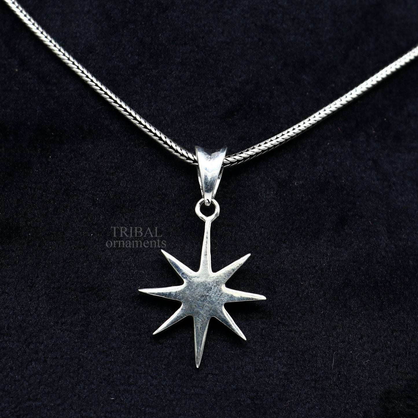 Unisex 925 sterling silver star pendant by TRIBAL ORNAMENTS, handmade, elegant jewelry with a plain silver star design.