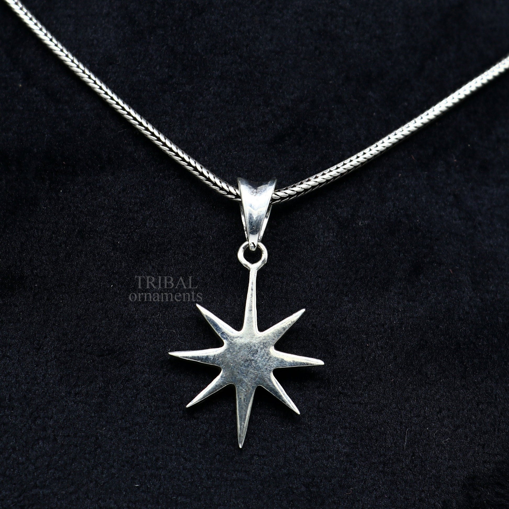 Unisex 925 sterling silver star pendant by TRIBAL ORNAMENTS, handmade, elegant jewelry with a plain silver star design.