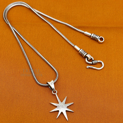 Unisex 925 sterling silver star pendant from Tribal Ornaments, handmade elegant jewelry with a simple, polished star design.