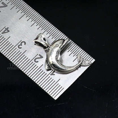Sterling silver dolphin fish pendant by TRIBAL ORNAMENTS, handmade stylish jewelry, perfect for gifting or religious occasions.