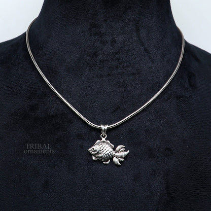 Stylish 925 sterling silver fish pendant with intricate design, handmade tribal jewelry suitable for gifting or religious use.