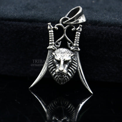 Sterling silver lion face pendant by TRIBAL ORNAMENTS, handmade hip hop jewelry with detailed lion design, perfect for custom jewelry.