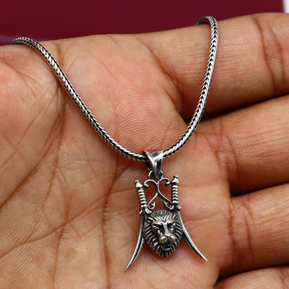 Sterling silver lion face pendant from TRIBAL ORNAMENTS, stylish handmade jewelry for hip hop and custom jewelry designs.