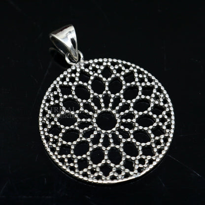 Stylish 925 sterling silver round floral pendant by TRIBAL ORNAMENTS, handcrafted jewelry perfect for gifting.
