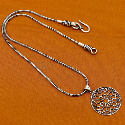 Sterling silver tribal ornaments round floral pendant, handmade stylish jewelry, perfect for gifting from India.