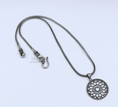Sterling silver floral round pendant by TRIBAL ORNAMENTS, handmade stylish jewelry perfect for gifting, featuring intricate floral design.