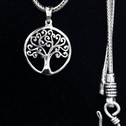 Sterling silver Tree pendant necklace by TRIBAL ORNAMENTS featuring a handmade, unique tree design, ideal for gifting jewelry from India.