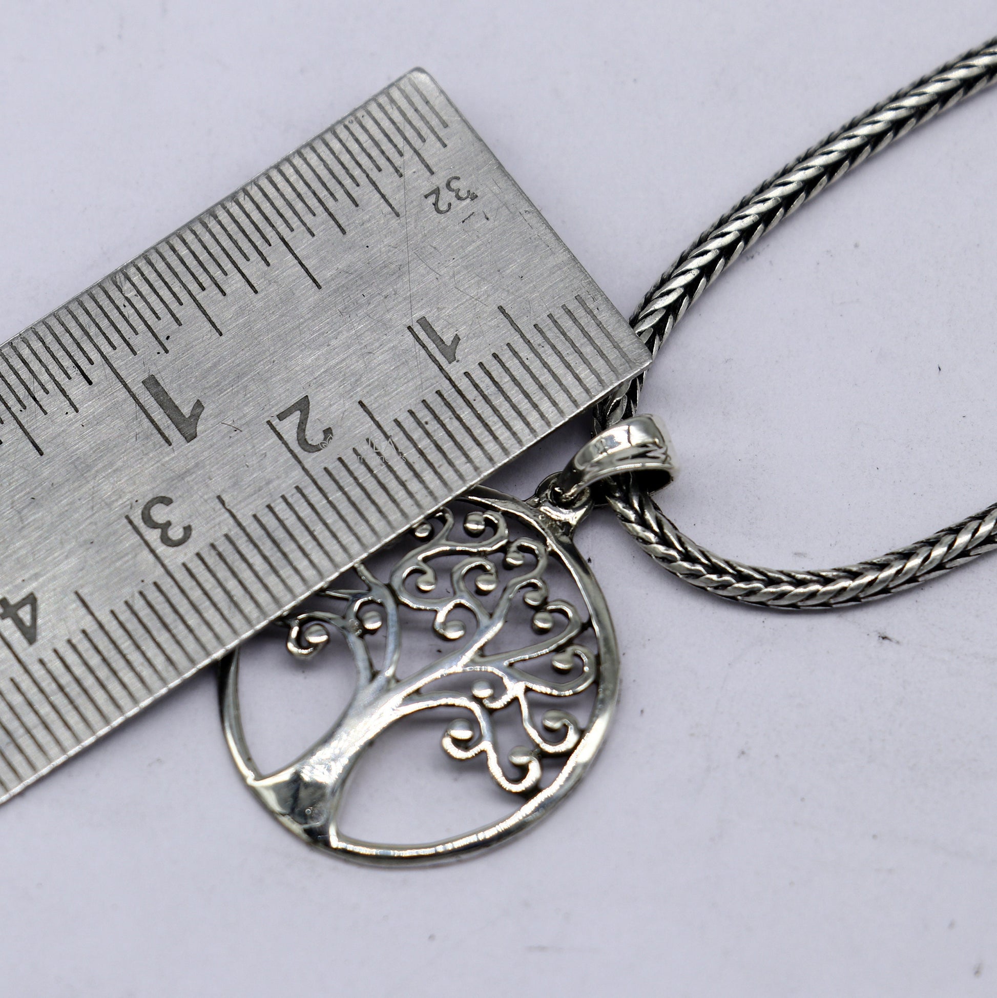 Sterling silver Tree pendant by Tribal Ornaments, handmade jewelry from India, showcasing a detailed, unique tree design for gifting.
