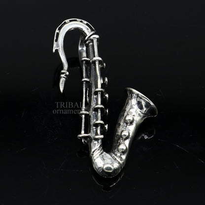 925 sterling silver small trumpet pendant, musical instrument jewelry from Tribal Ornaments, detailed cornet design for gift or accessory.