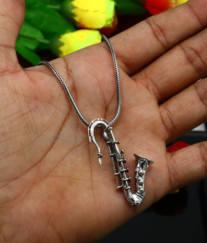 925 sterling silver small trumpet pendant from TRIBAL ORNAMENTS, detailed musical instrument jewelry for gift or collection.