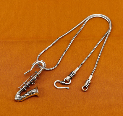 925 sterling silver small trumpet pendant by Tribal Ornaments, detailed musical instrument jewelry for gift or collection.
