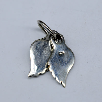 925 sterling silver bird wing pendant featuring a detailed feather design, suitable as animal jewelry or angel wing necklace.