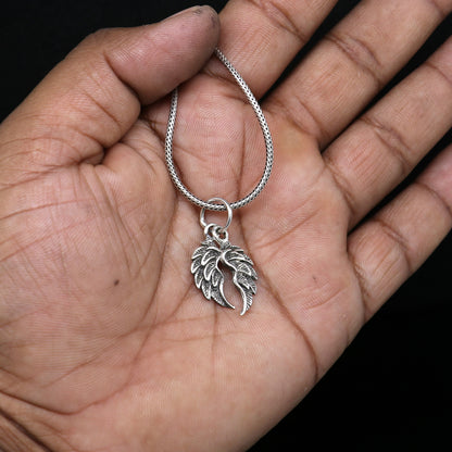 925 sterling silver bird wing pendant with detailed feather design, animal jewelry featuring a delicate angel wing motif.