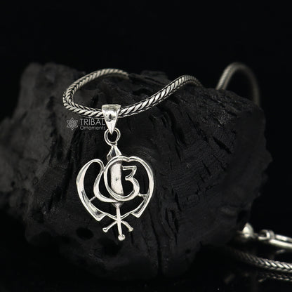 Sterling silver Punjabi Sikh Khalsa pendant with intricate divine design, crafted by TRIBAL ORNAMENTS for meaningful jewelry.