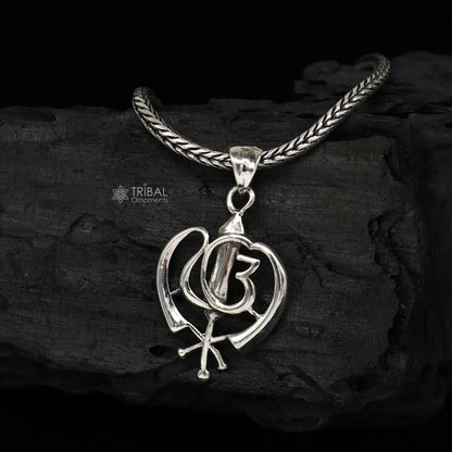 925 Sterling silver Punjabi Sikh Khalsa pendant with intricate divine design, ideal for gifting jewelry by TRIBAL ORNAMENTS.
