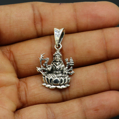 925 sterling silver Goddess Laxmi Mataji pendant from TRIBAL ORNAMENTS, featuring a unique tribal design in personalized jewelry style.
