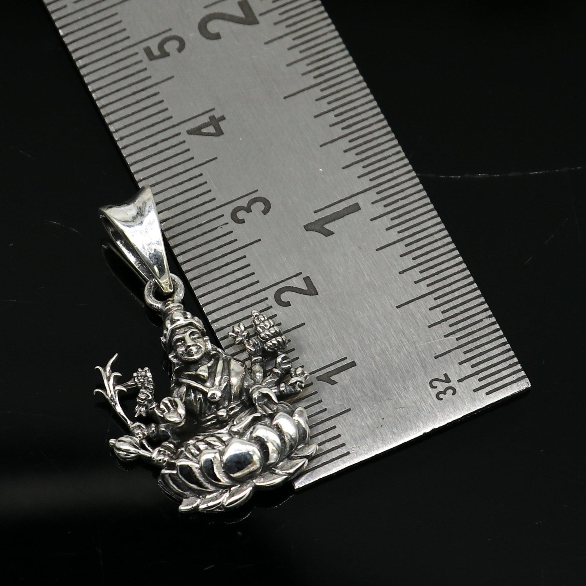 925 sterling silver Goddess Laxmi Mataji pendant with intricate tribal design, personalized jewelry by TRIBAL ORNAMENTS.