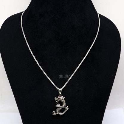 925 sterling silver dragon design pendant from TRIBAL ORNAMENTS, unisex cultural jewelry with intricate tribal-inspired details.