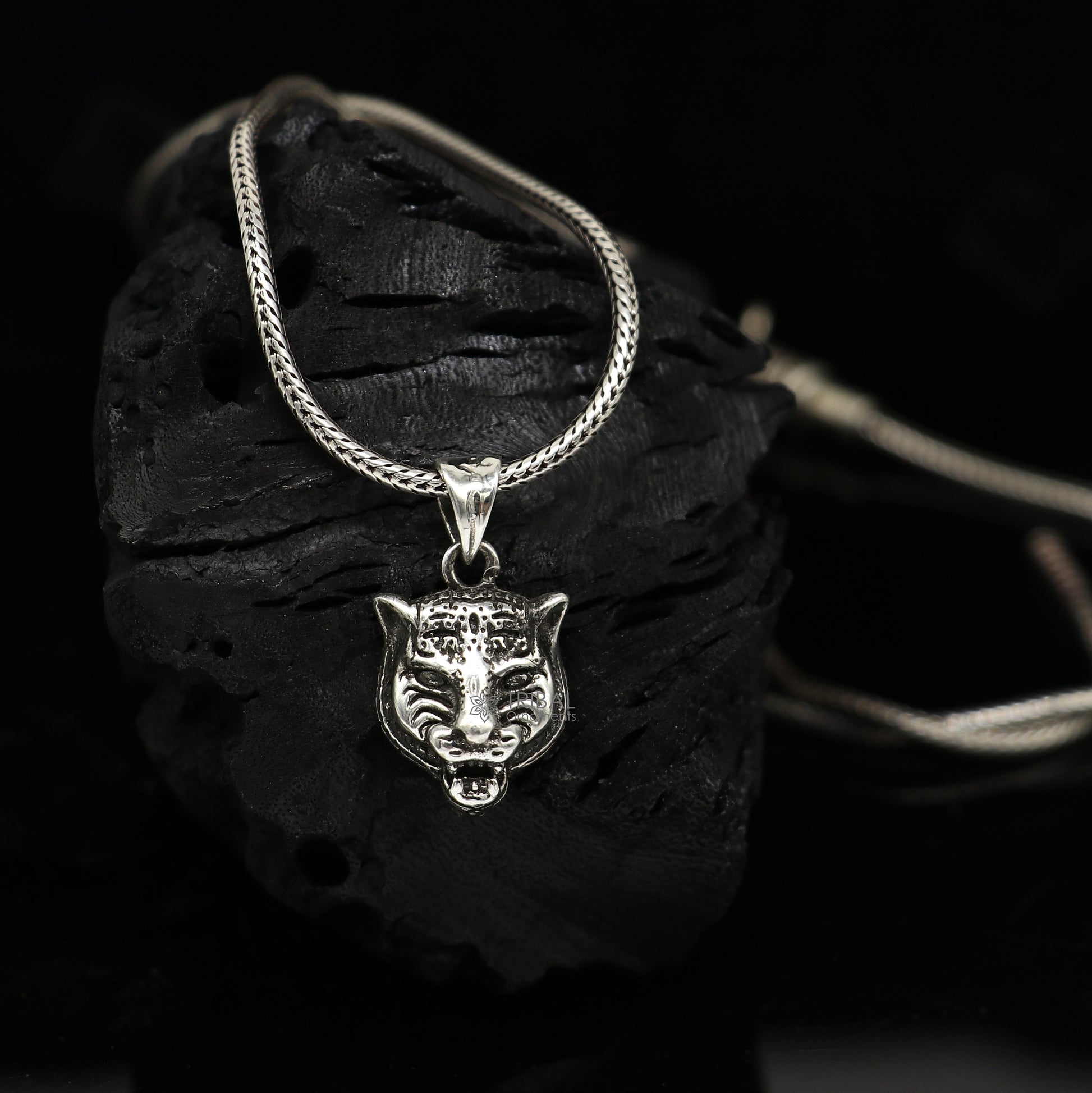 925 sterling silver lion face pendant from Tribal Ornaments, detailed animal jewelry with a fierce lion's head design.