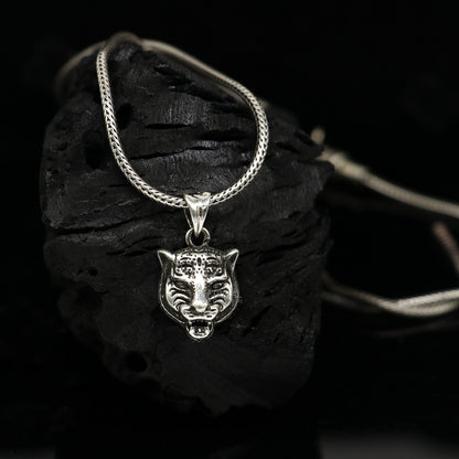 925 sterling silver lion face pendant from Tribal Ornaments, detailed animal jewelry with a fierce lion's head design.