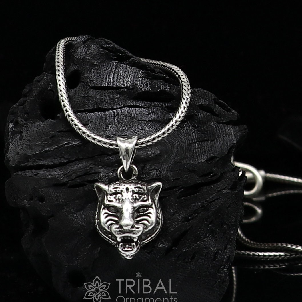 925 sterling silver lion face pendant from Tribal Ornaments, featuring a detailed animal jewelry design with a forest king motif.