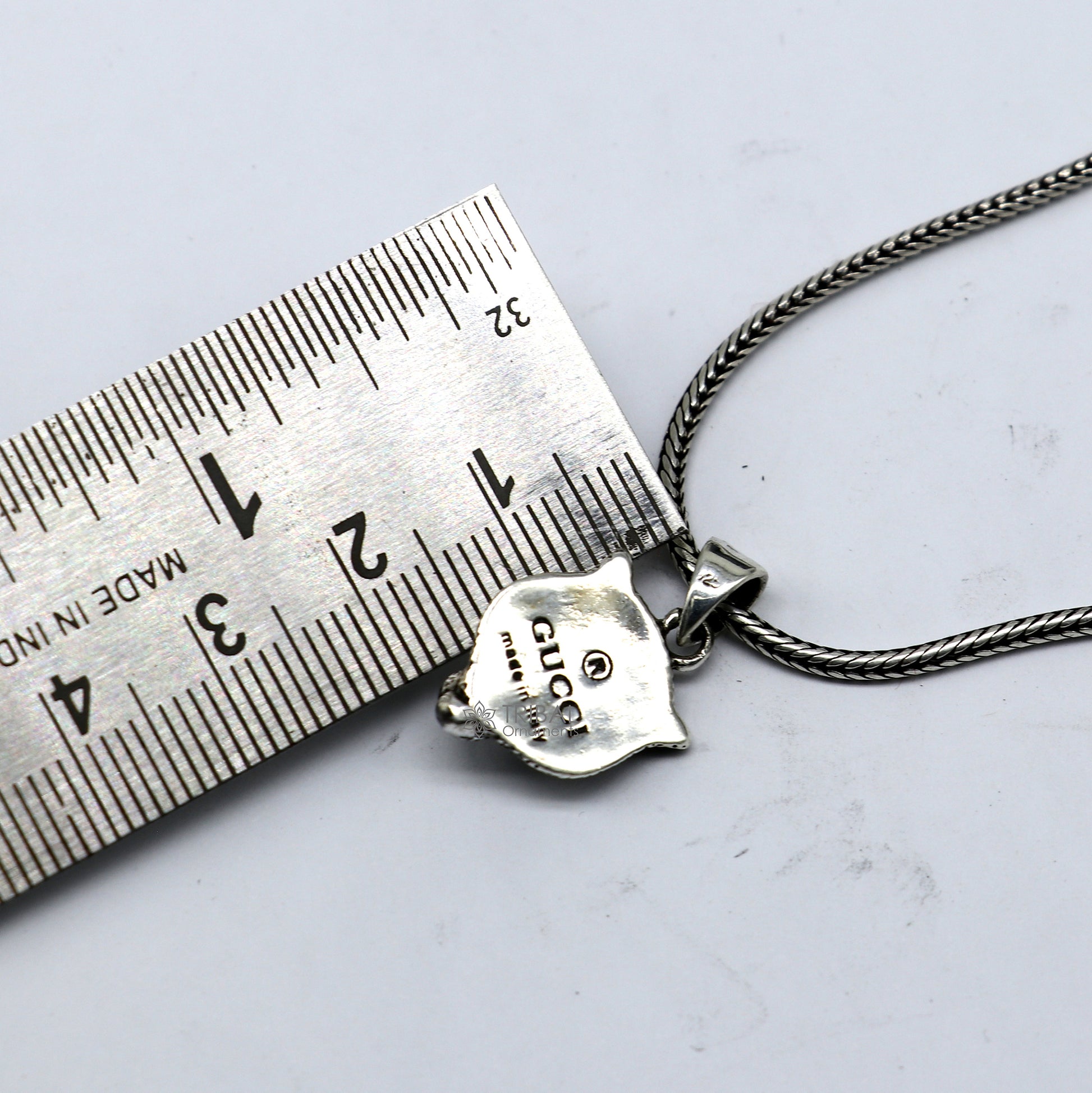 925 sterling silver lion face pendant from Tribal Ornaments, detailed animal jewelry featuring a bold lion head design.