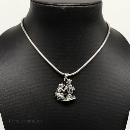 Sterling silver Lord Shiva, Parwati, and Nandi Maharaj pendant with Shiva Lingam, crafted by TRIBAL ORNAMENTS.