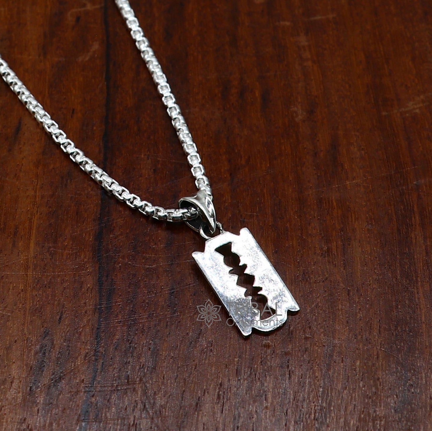 Sterling silver Razor Blade pendant by TRIBAL ORNAMENTS, unisex jewelry with unique, trendy razor blade design for necklaces.