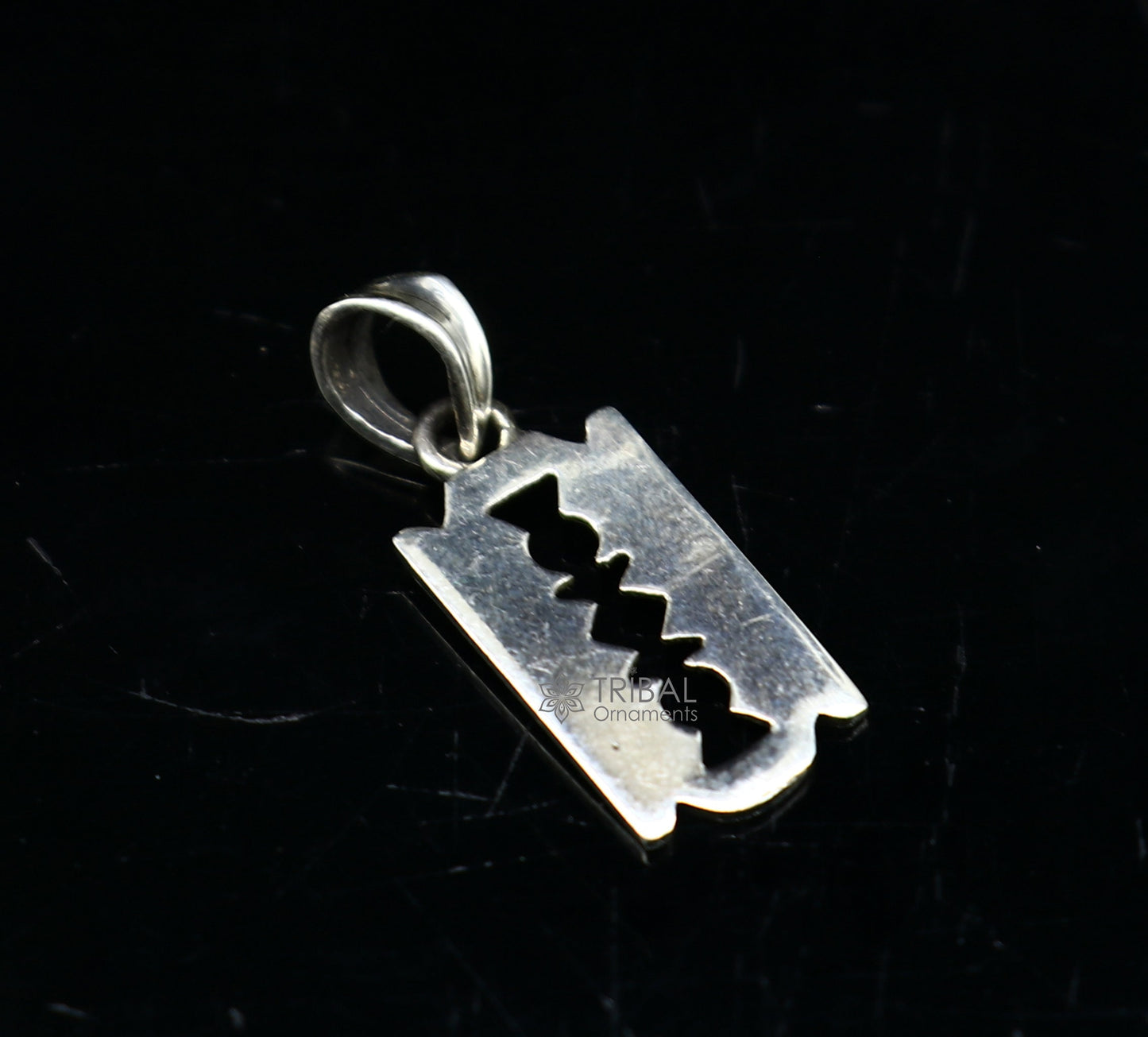 925 silver Razor Blade pendant by TRIBAL ORNAMENTS, unisex jewelry featuring a bold, cultural design in a sleek silver finish.
