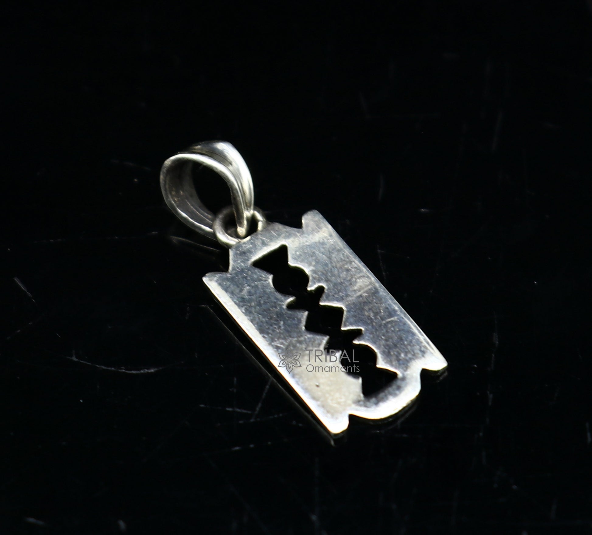 925 silver Razor Blade pendant by TRIBAL ORNAMENTS, unisex jewelry featuring a bold, cultural design in a sleek silver finish.