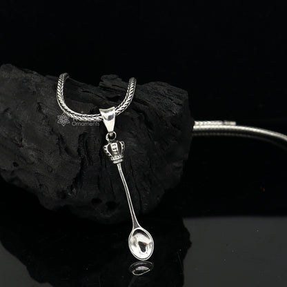 Sterling silver men's pendant with a unique spoon design from TRIBAL ORNAMENTS, showcasing intricate craftsmanship and modern style.