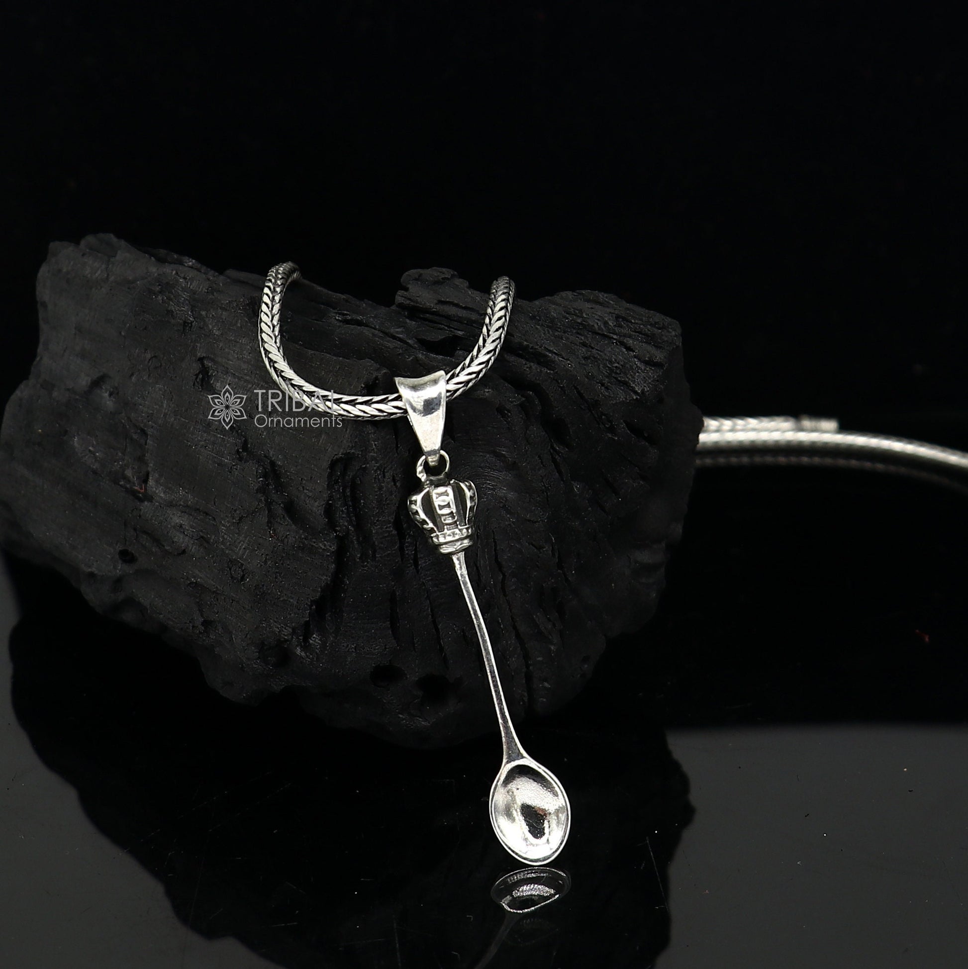 925 Sterling silver men's pendant with a unique spoon design from TRIBAL ORNAMENTS, showcasing detailed craftsmanship.