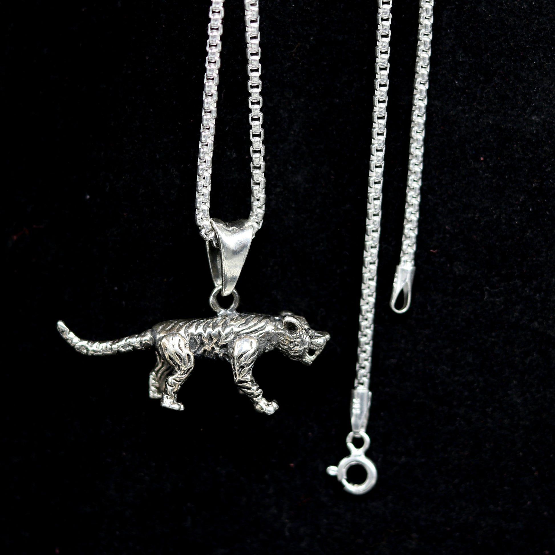 Sterling silver tiger/lion pendant necklace by TRIBAL ORNAMENTS, unisex cultural designer jewelry, detailed animal design.