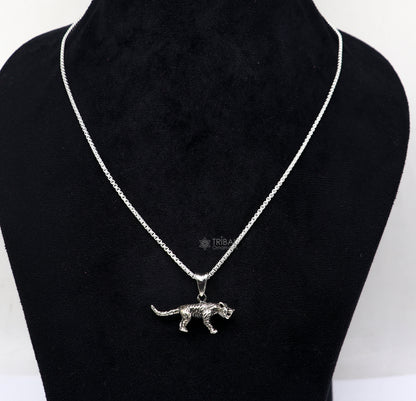 Sterling silver tiger/lion design pendant necklace by TRIBAL ORNAMENTS, unisex cultural jewelry with intricate animal motif.