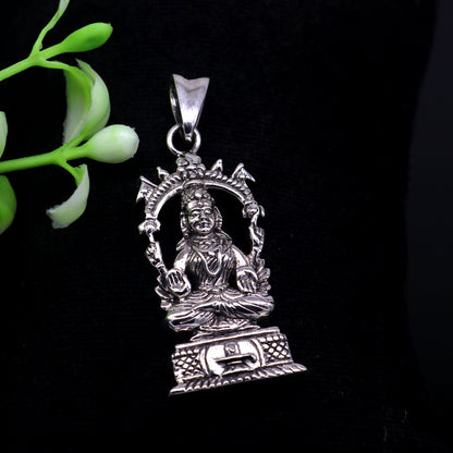 Sterling silver vintage goddess Laxmi pendant, stylish unisex jewelry by TRIBAL ORNAMENTS, featuring intricate Hindu goddess design.