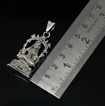 Sterling silver vintage goddess Laxmi pendant by TRIBAL ORNAMENTS, featuring an intricate Hindu goddess design in antique style.