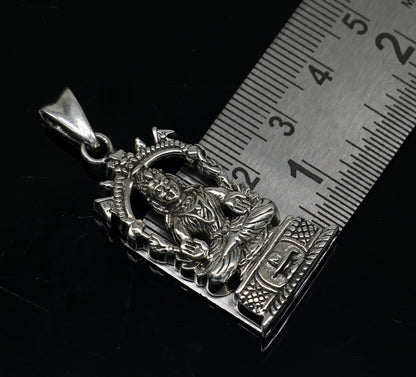 Sterling silver vintage Laxmi goddess pendant by TRIBAL ORNAMENTS, detailed antique-style unisex jewelry for gifting.