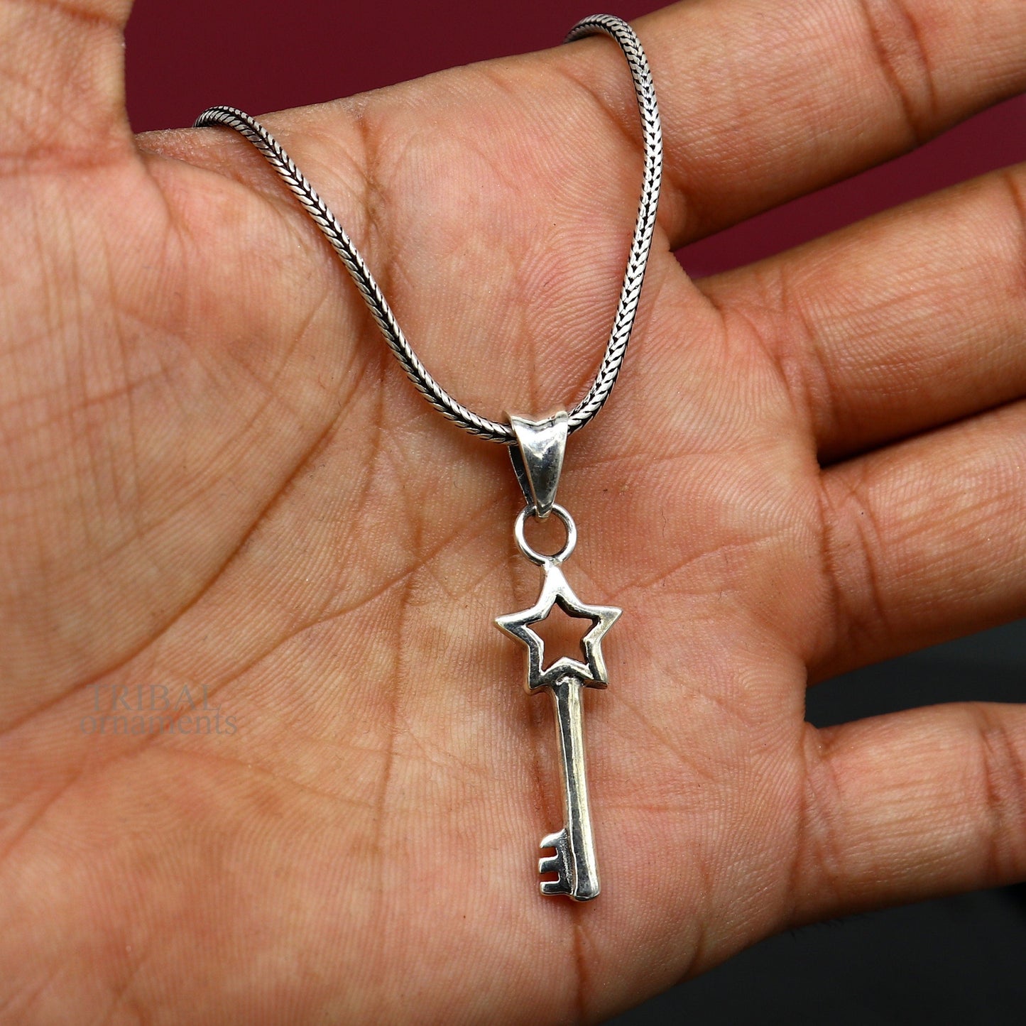 Sterling silver key and lock pendant from TRIBAL ORNAMENTS, vintage handmade jewelry for boys and girls, stylish and attractive.