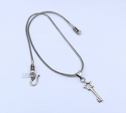 Sterling silver key and lock pendant by Tribal Ornaments, vintage-style handmade jewelry for boys and girls, stylish and attractive.