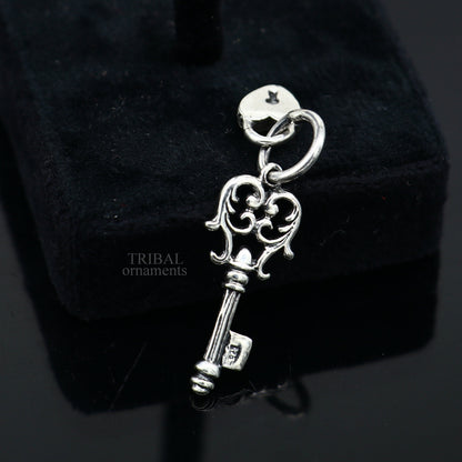 Sterling silver vintage style key and lock pendant by Tribal Ornaments, handcrafted jewelry for boys and girls.