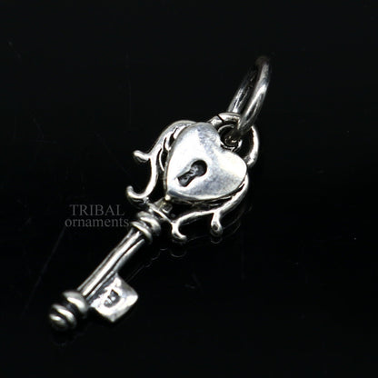 Sterling silver vintage style key and lock pendant by Tribal Ornaments, handmade jewelry for boys and girls.
