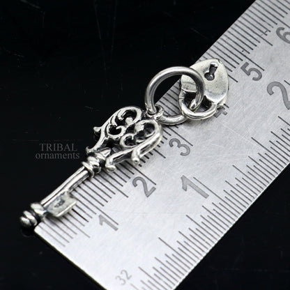 Vintage style 925 sterling silver key and lock pendant by Tribal Ornaments, featuring intricate handmade design for boys and girls.